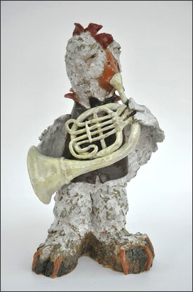 Horn playing bird, stonware, vitrous slips, oxides and glazes
